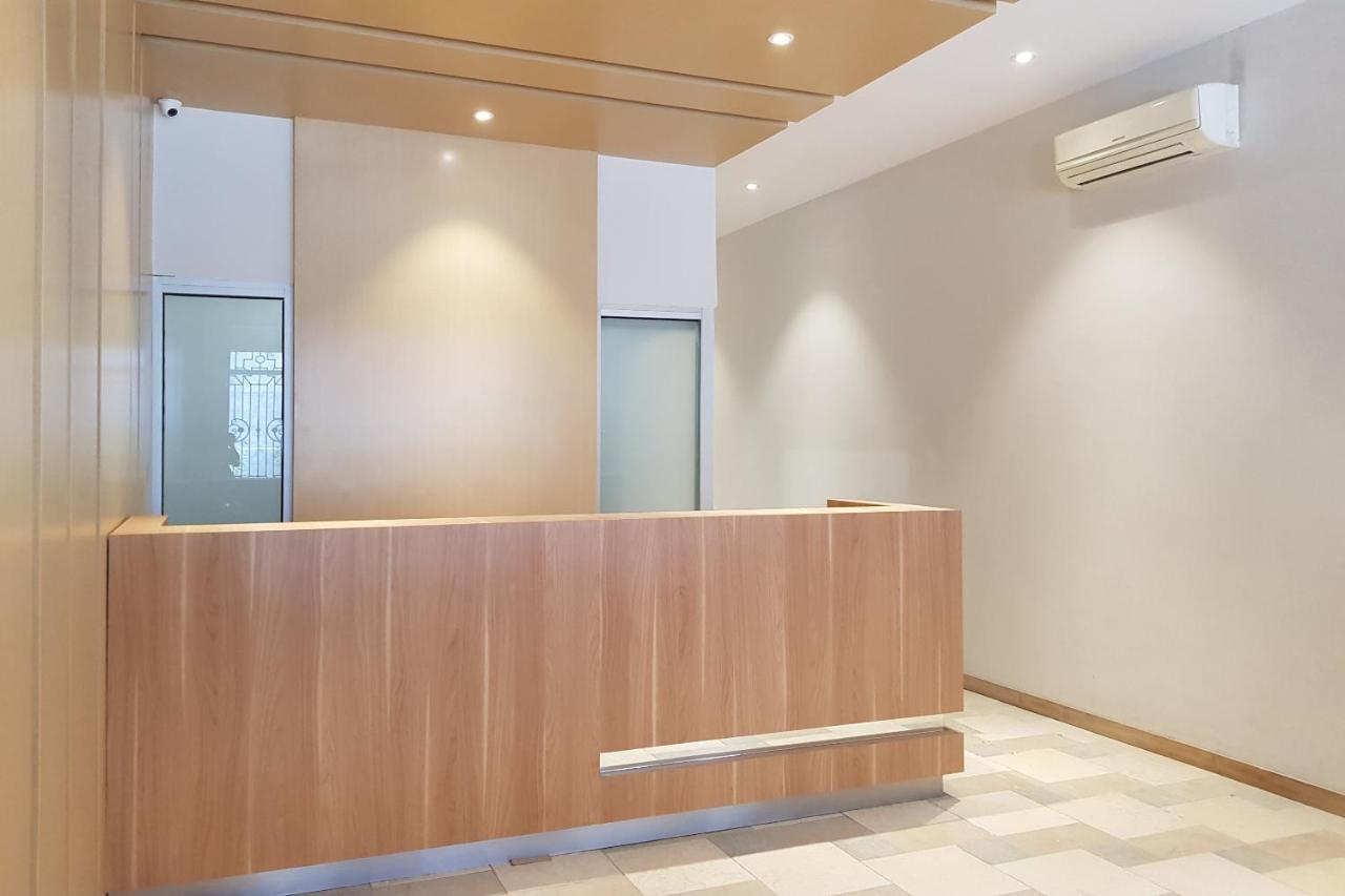 Oyo 90015 Platinum Guest House Medan Exterior photo